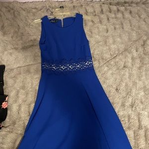 Size 4 blue dresses, never worn is about above the knee length